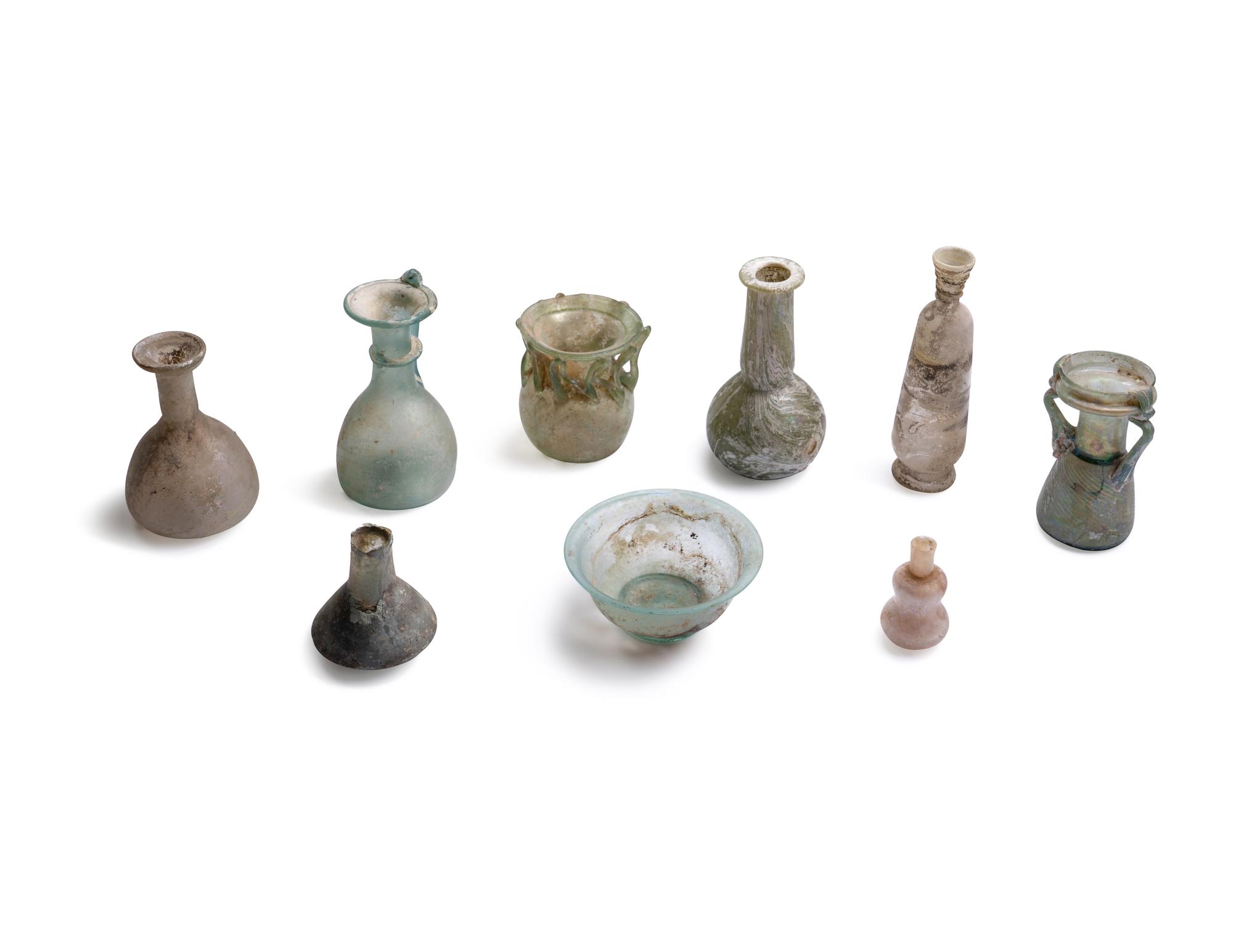 A Group of 8 Roman Glass Vessels