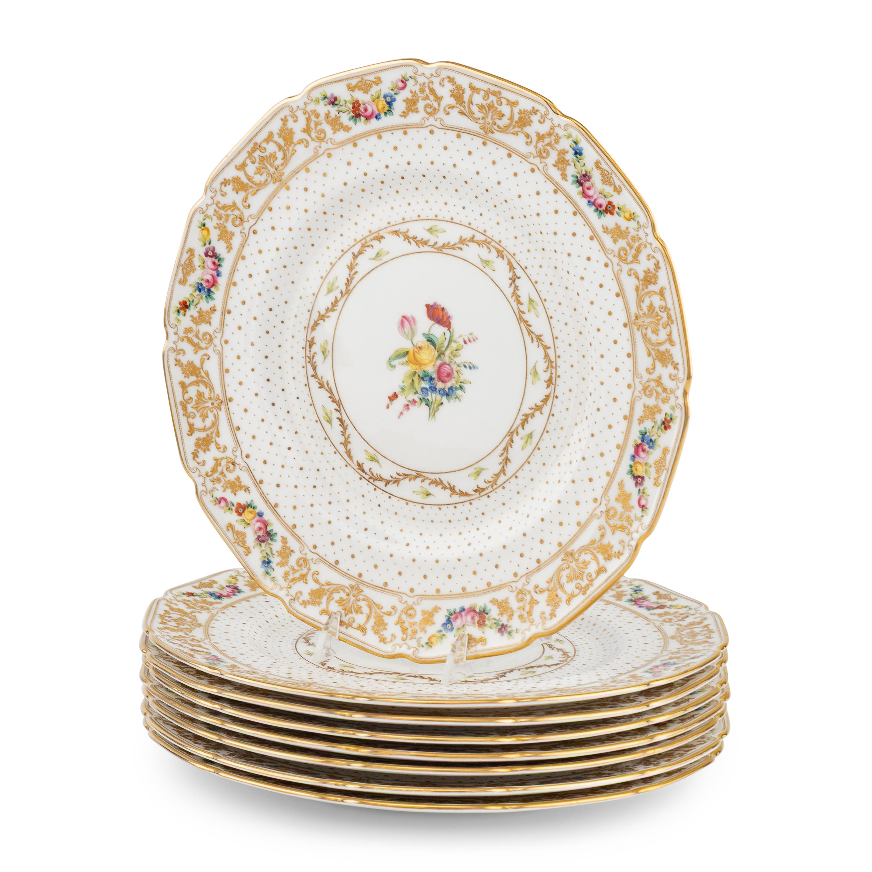 A Set of Eight Royal Doulton Porcelain Dinner Plates