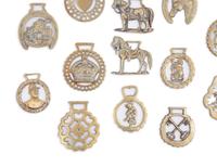 A Collection of Twenty Five Pressed and Cast Brass Buckles