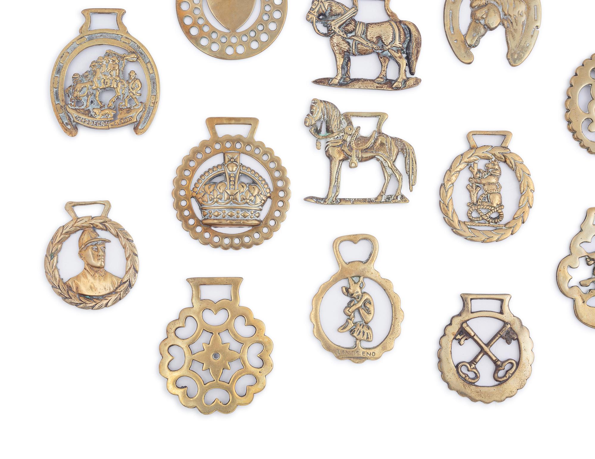 A Collection of Twenty Five Pressed and Cast Brass Buckles