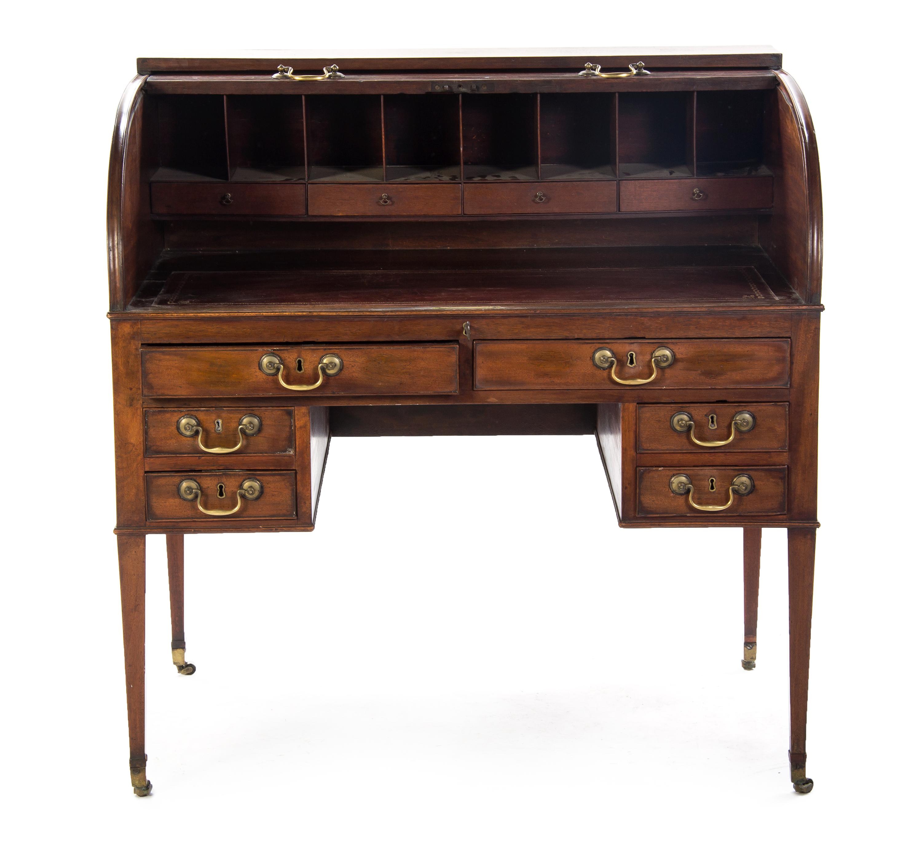 A George III Mahogany Roll Top Desk, Height 43 3/8 x width 42 1/8 x depth 28 inches. — EARLY 19TH CENTURY,