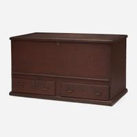 A red-painted blanket chest with Fraktur under lid Northampton County, PA, circa 1800