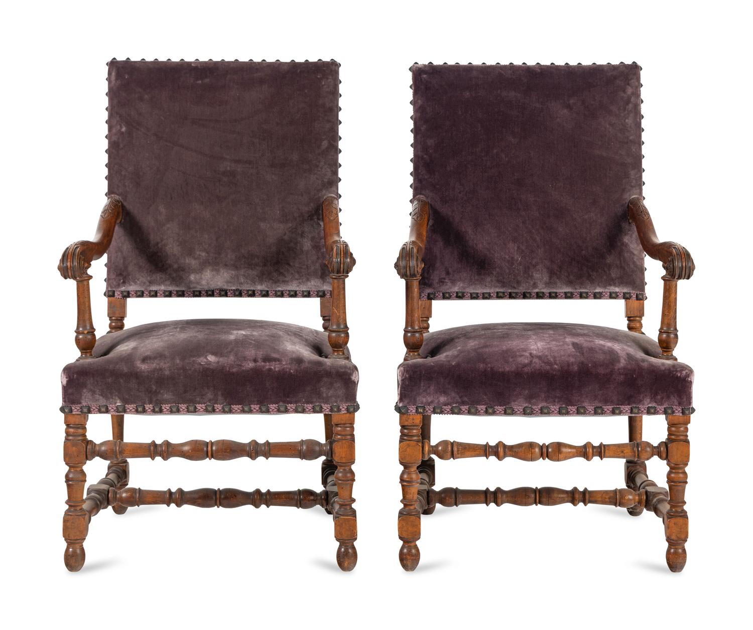 A Pair of Louis XIV Style Carved Fruitwood Fauteuils