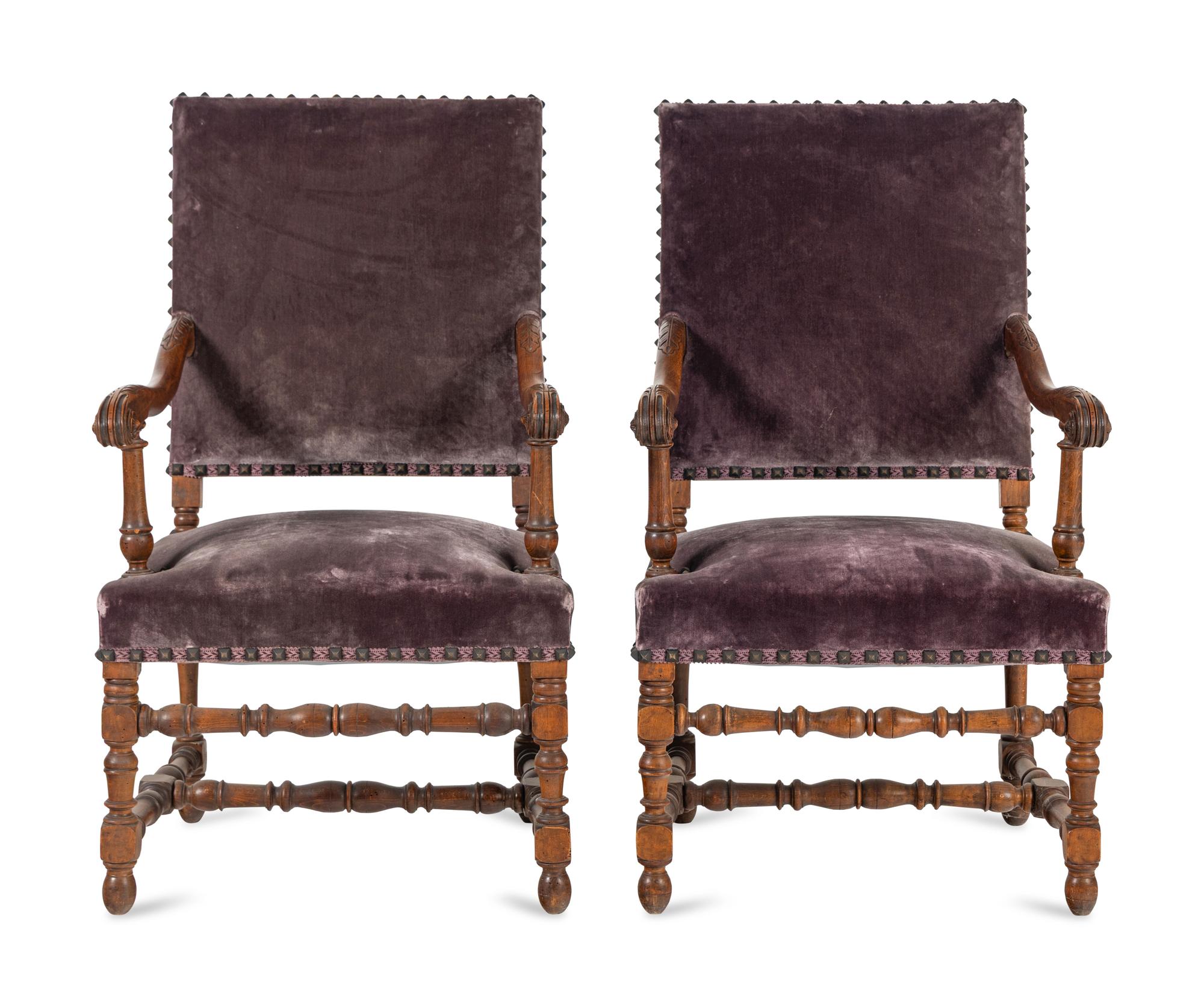 A Pair of Louis XIV Style Carved Fruitwood Fauteuils