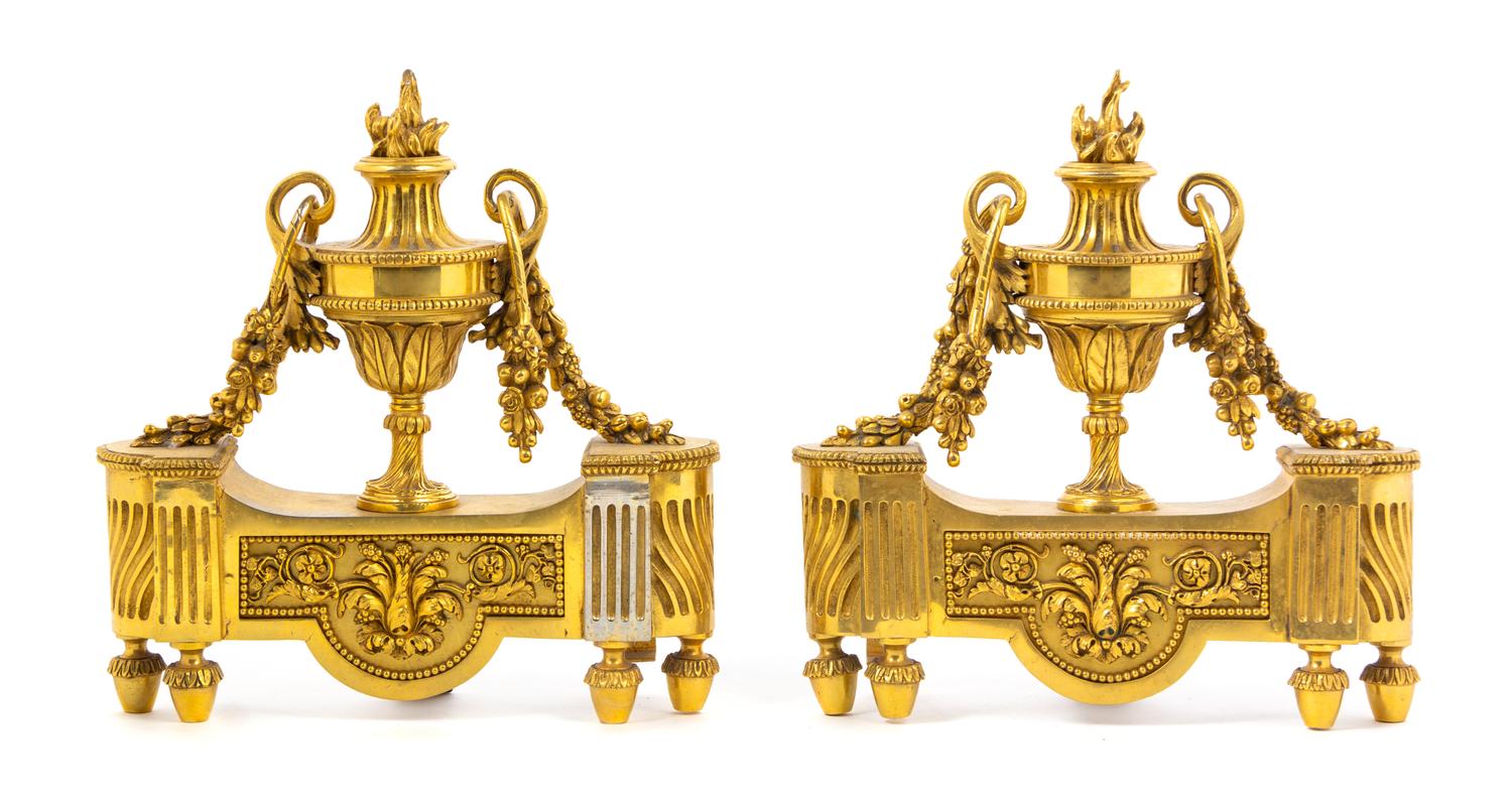 A Pair of Louis XVI Style Gilt Bronze Chenets Width 10 1/2 inches. — 19TH CENTURY