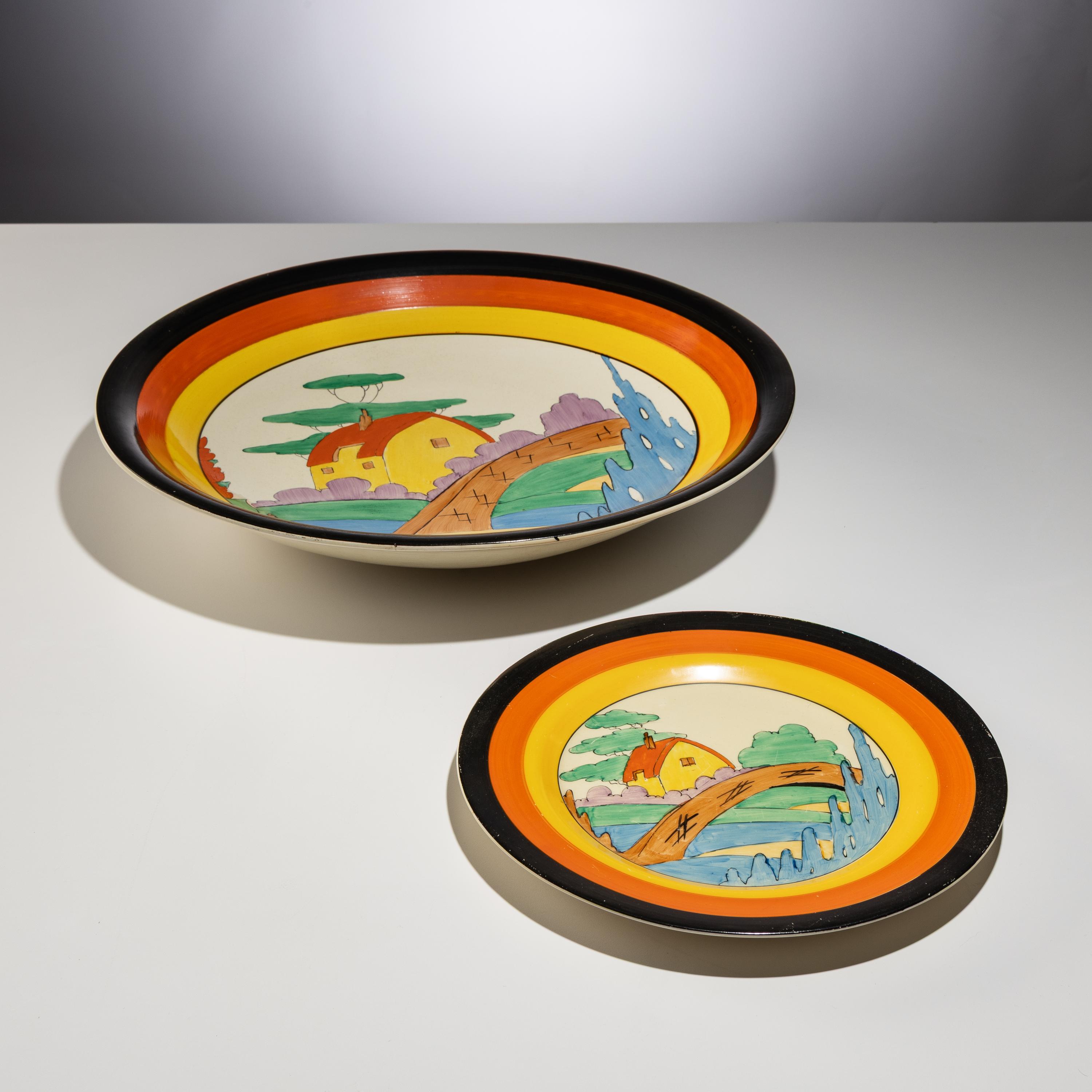 Clarice Cliff (English, 1899–1972) — Two Orange Roof Cottage pattern Platters