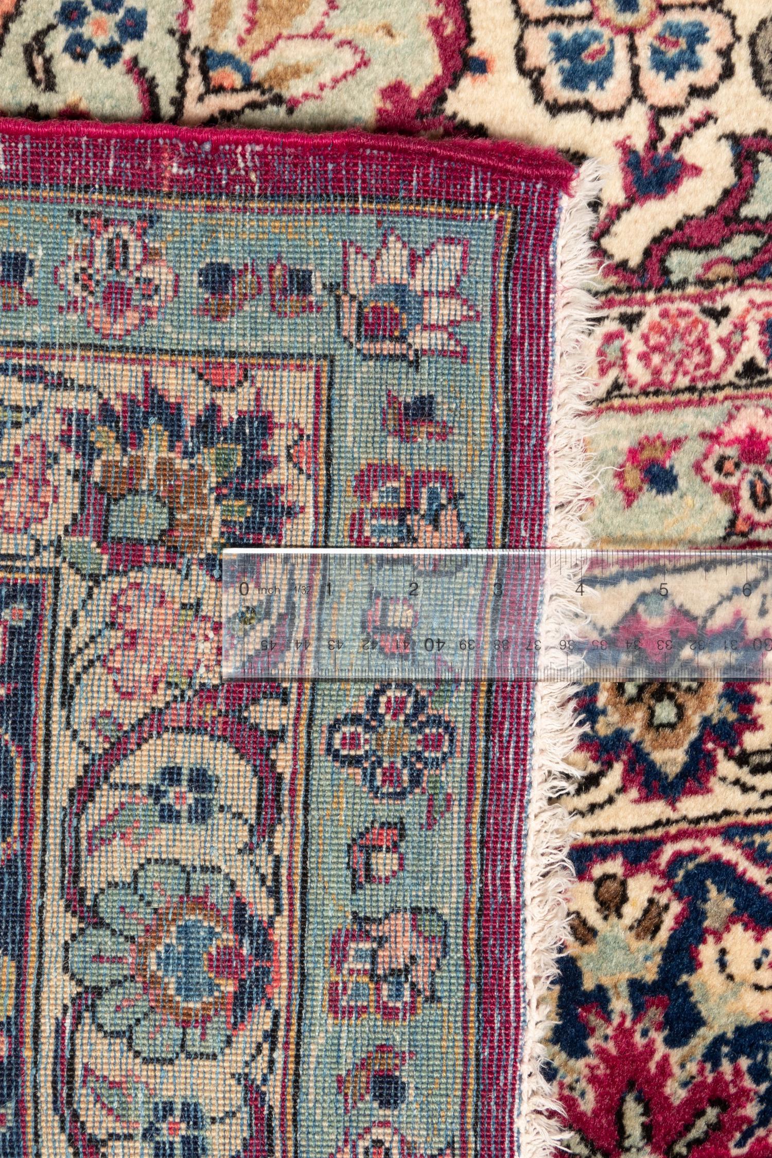 A Kashan Wool Rug