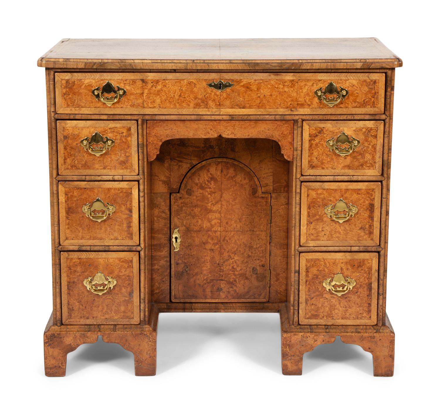 A George II Style Yew and Walnut Kneehole Desk