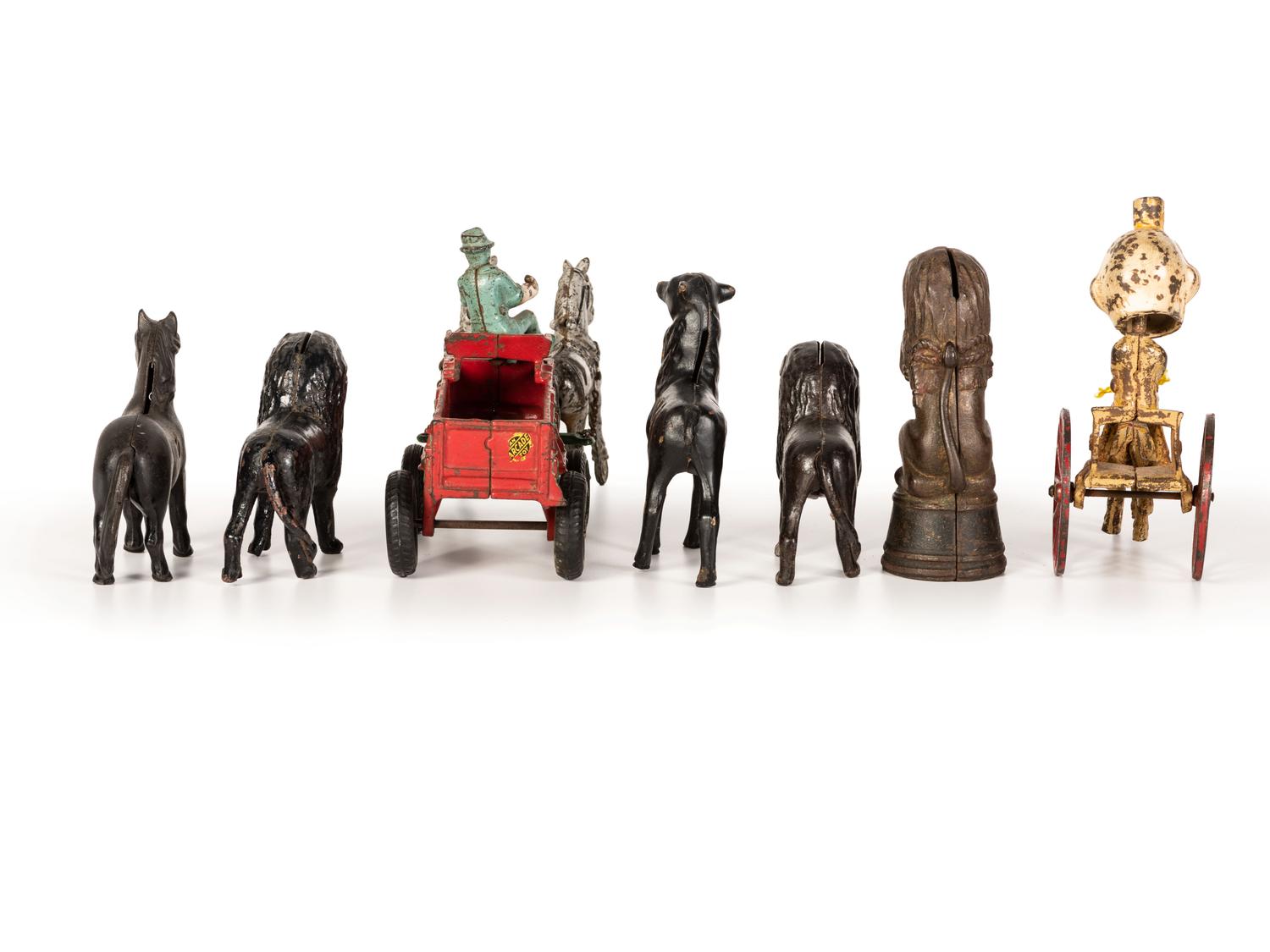 A Group of Cast Iron Banks and Pull Toys