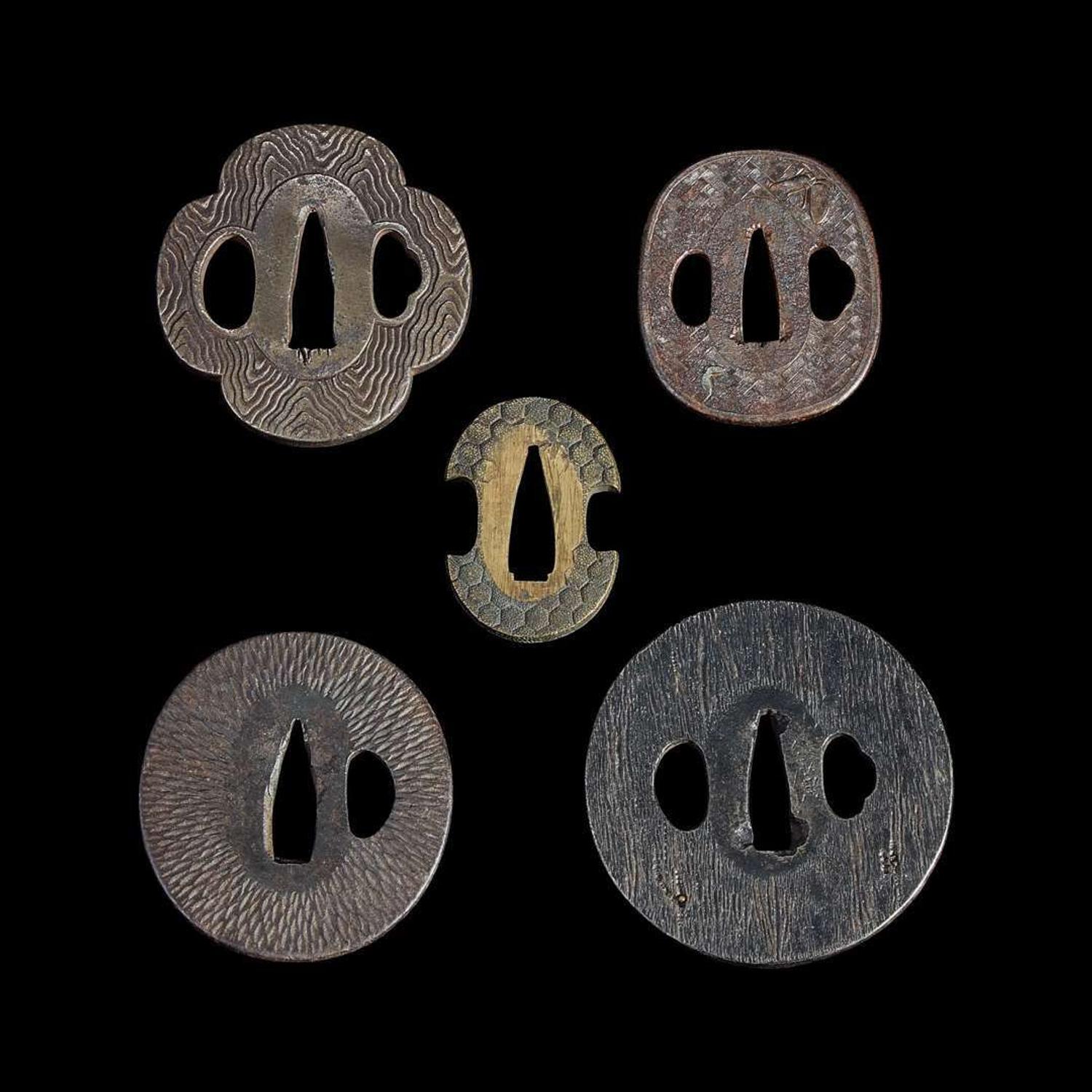 Group of fifteen assorted Japanese tsuba Meiji period and earlier