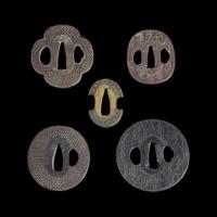 Group of fifteen assorted Japanese tsuba Meiji period and earlier
