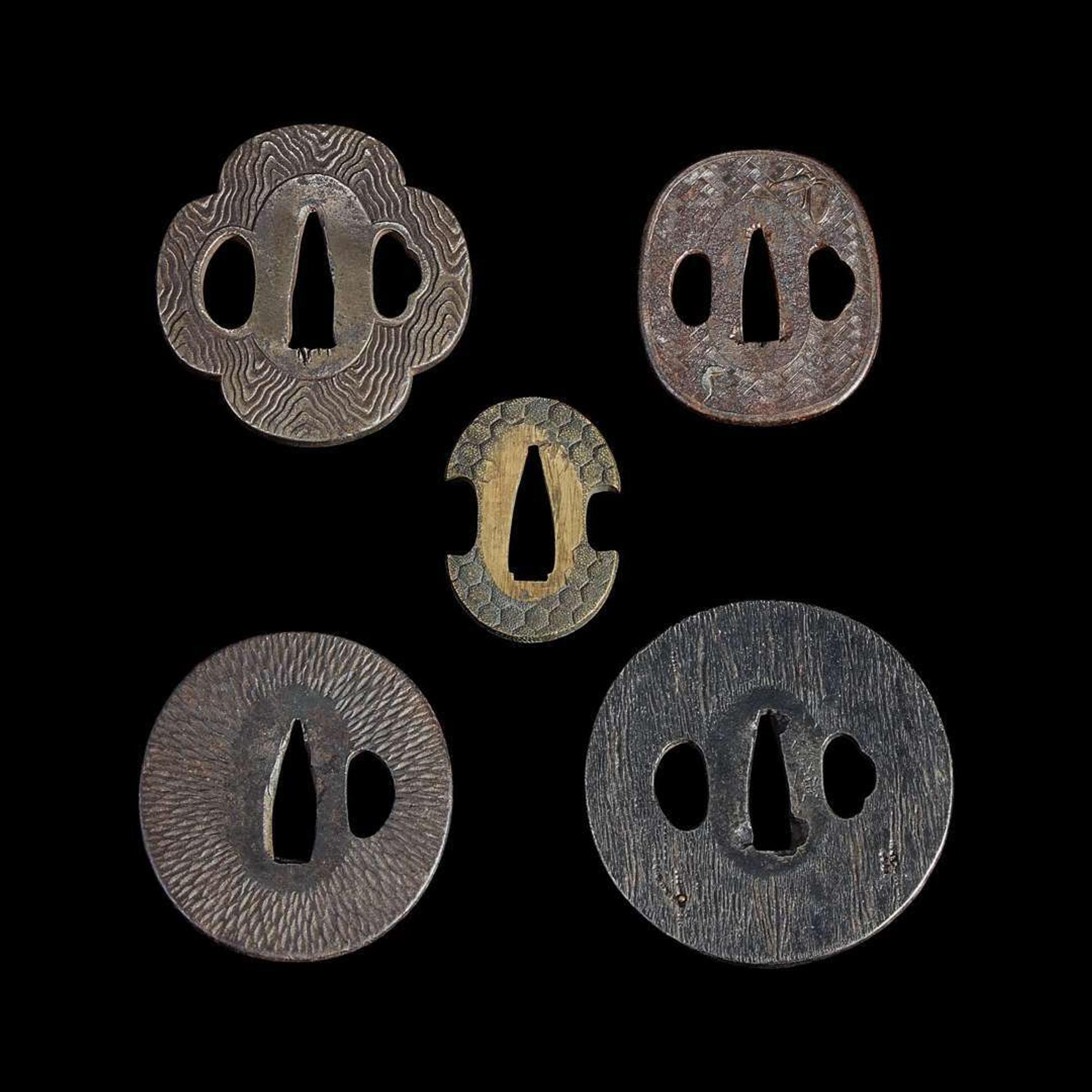 Group of fifteen assorted Japanese tsuba Meiji period and earlier
