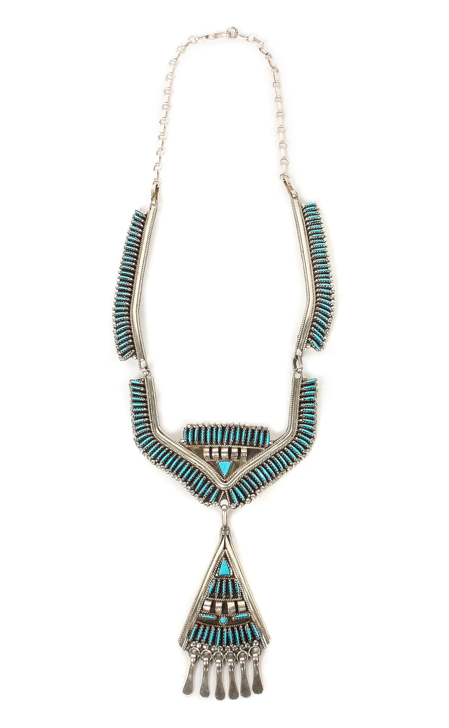 A Zuni Silver and Turquoise Needlepoint Necklace Length 20 inches; pendant length 3 inches.