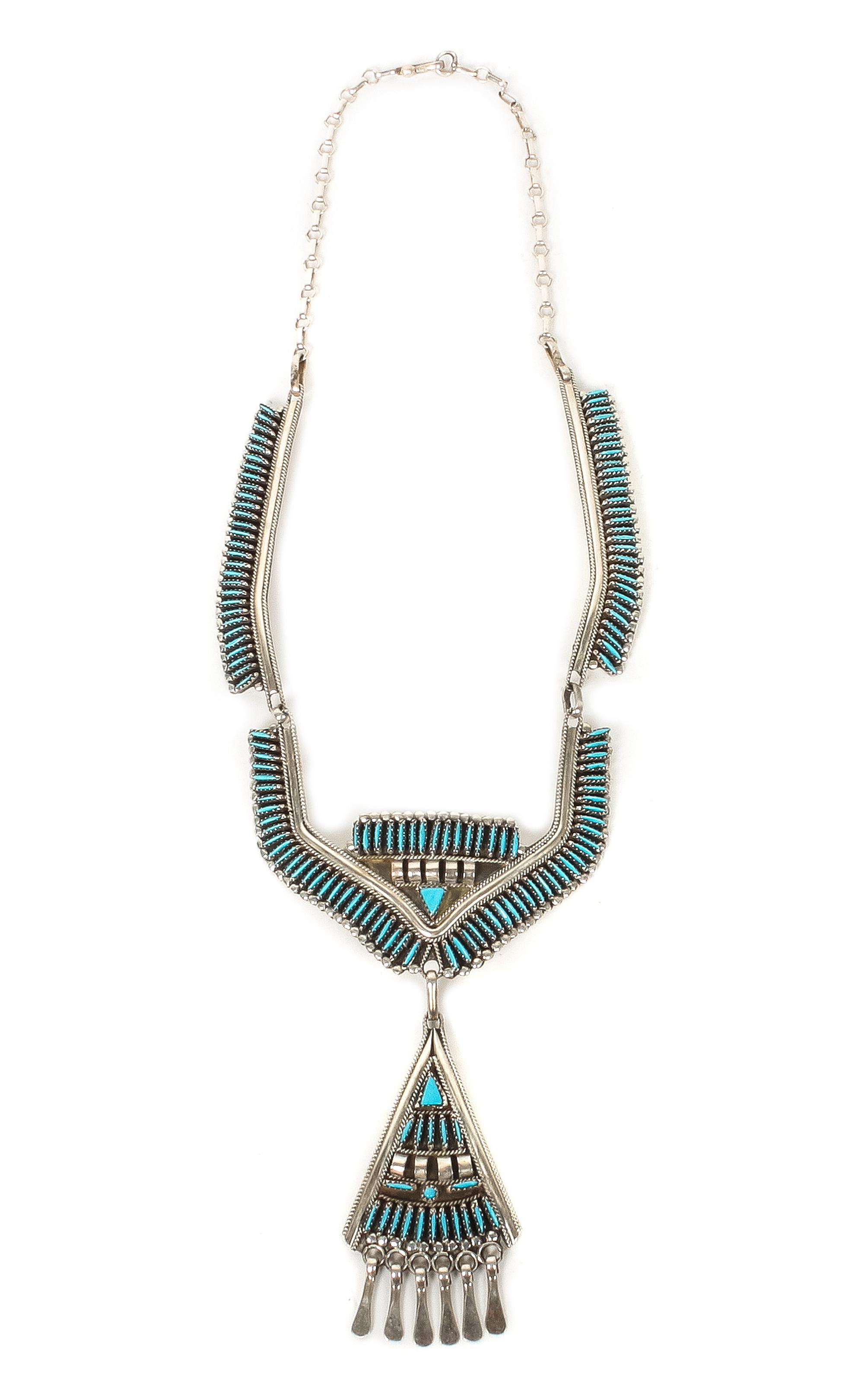 A Zuni Silver and Turquoise Needlepoint Necklace Length 20 inches; pendant length 3 inches.