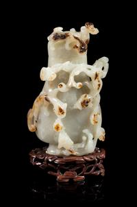 A Russet and Pale Celadon Jade Covered Vase Height 5 inches. — 19TH/EARLY 20TH CENTURY
