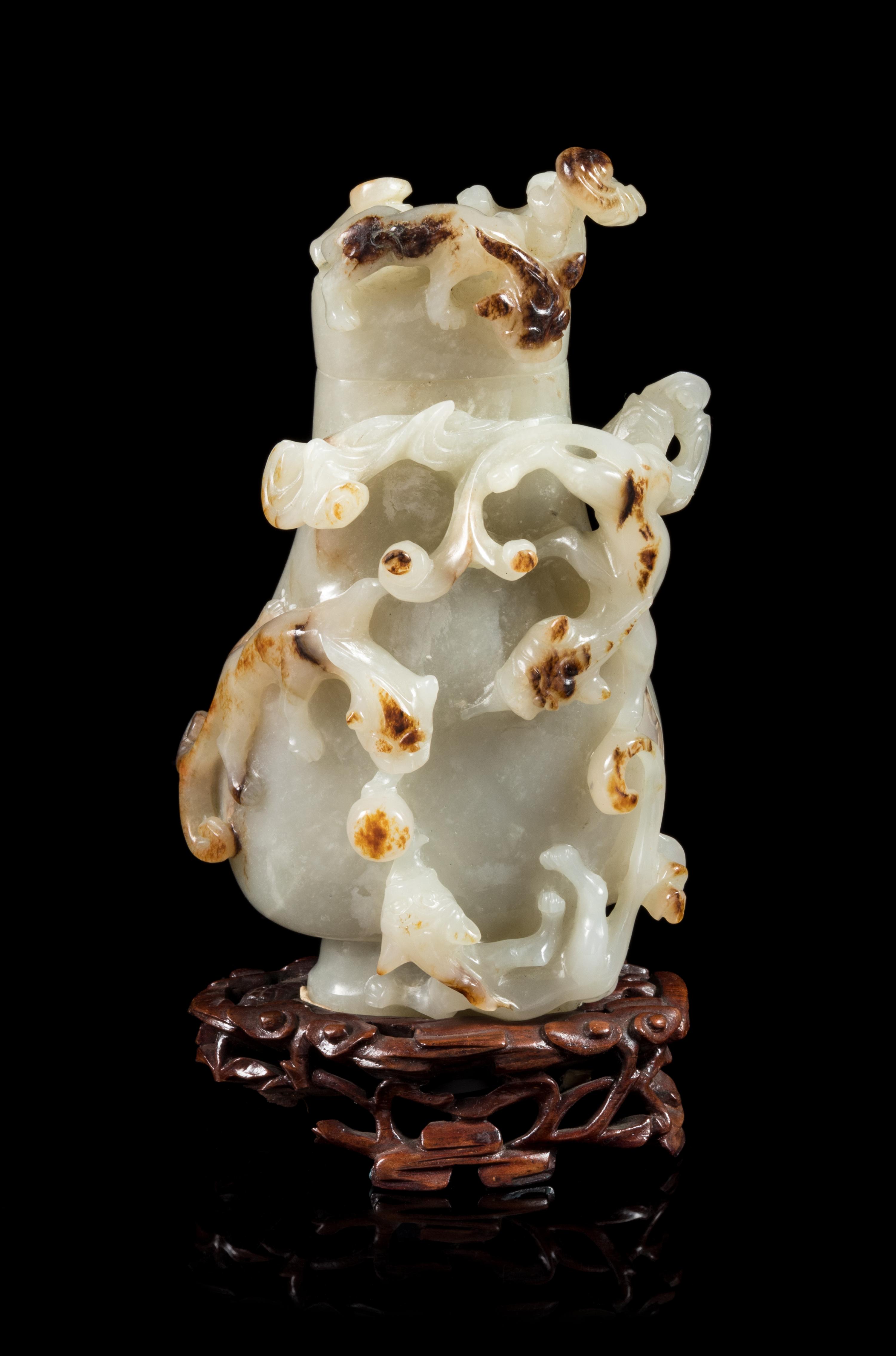 A Russet and Pale Celadon Jade Covered Vase Height 5 inches. — 19TH/EARLY 20TH CENTURY