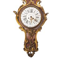 A Louis XV Style Gilt Bronze Mounted Kingwood Cartel Clock and Barometer