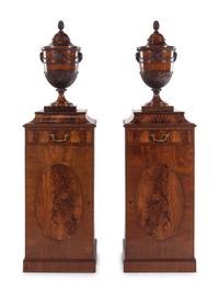 A Pair of Edwardian Style Mahogany Cutlery Urns on Pedestals
