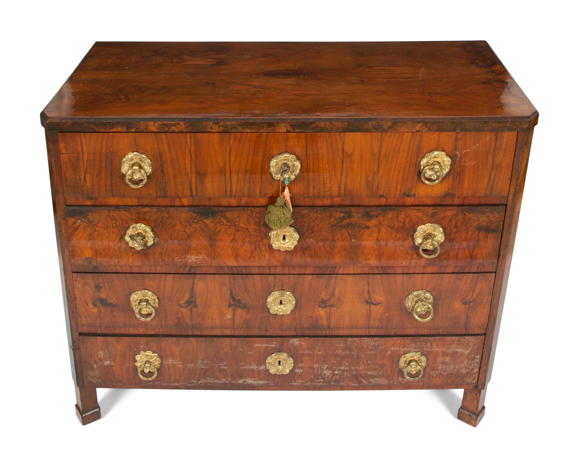 A Biedermeier Walnut Veneered and Grain-Painted Commode