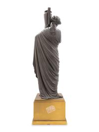 A Continental Bronze Figure of a Classical Maiden with an Ewer