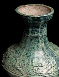 A Chinese Molded Green Glazed Pottery Hu Vase