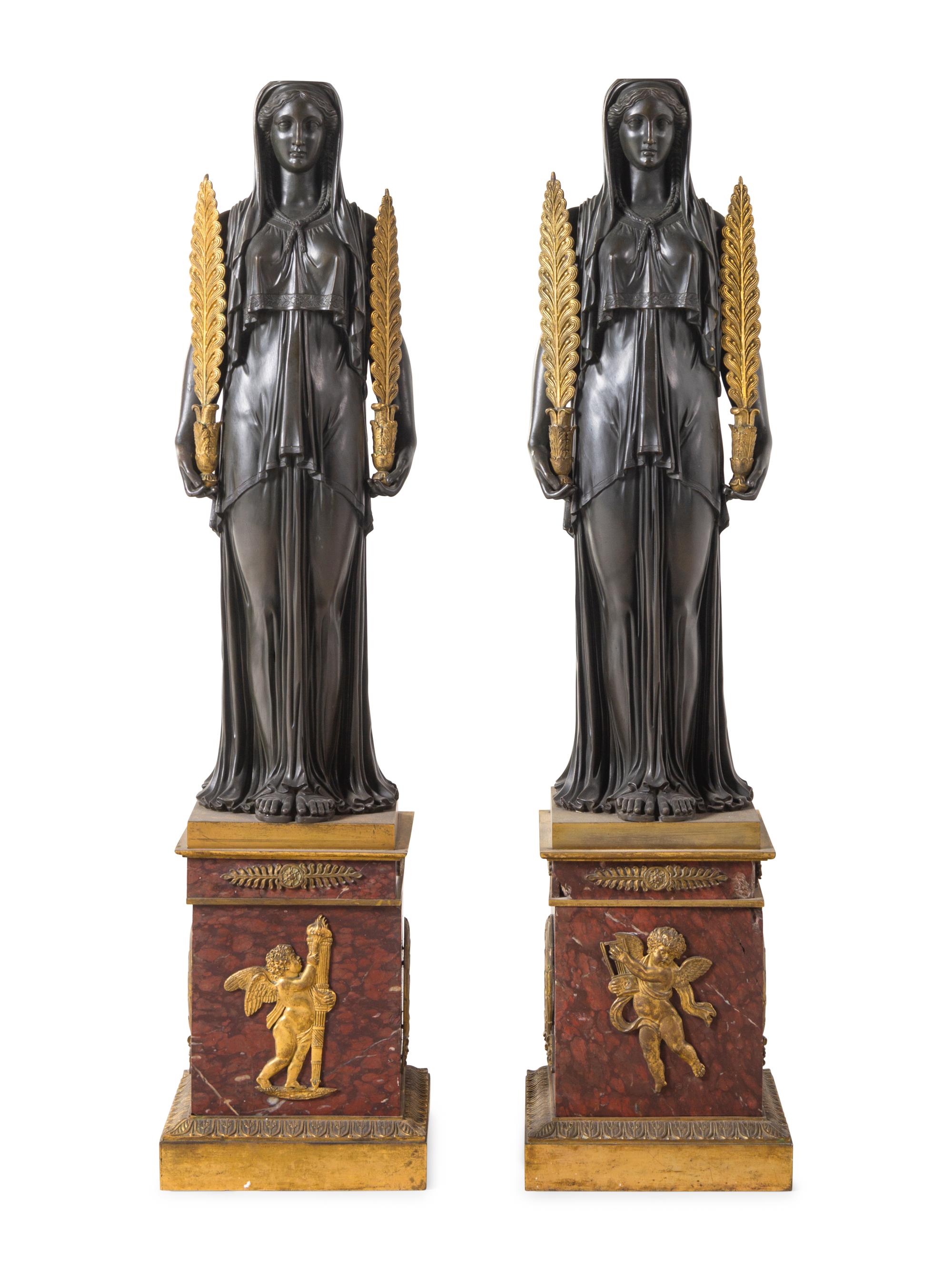 A Pair of Large Empire Style Gilt and Patinated Bronze and Marble Figural Candelabra Bases