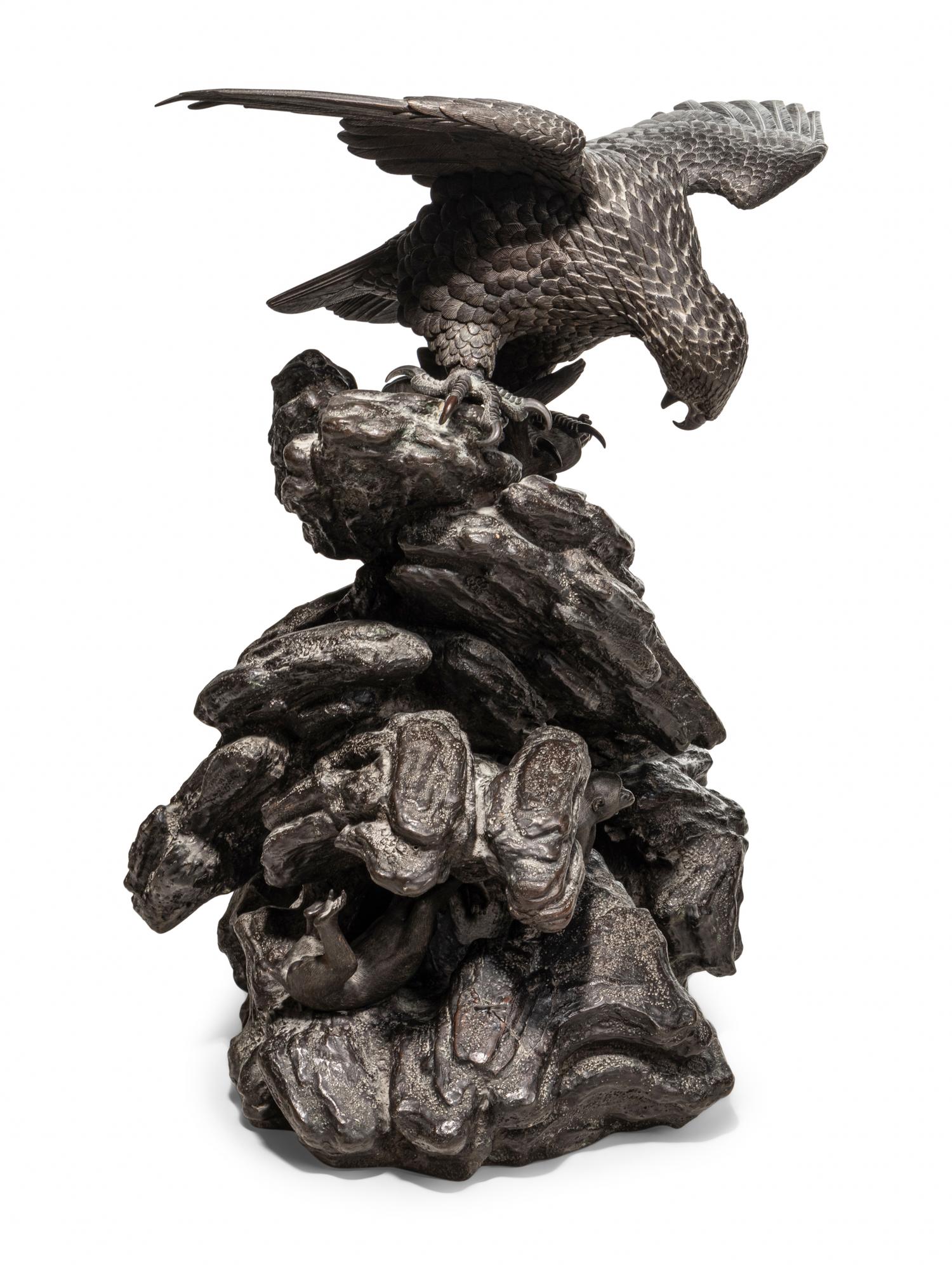 A Japanese Bronze Figural Group of a Hawk Hunting Monkeys
