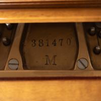 A Steinway and Sons Walnut Grand Piano