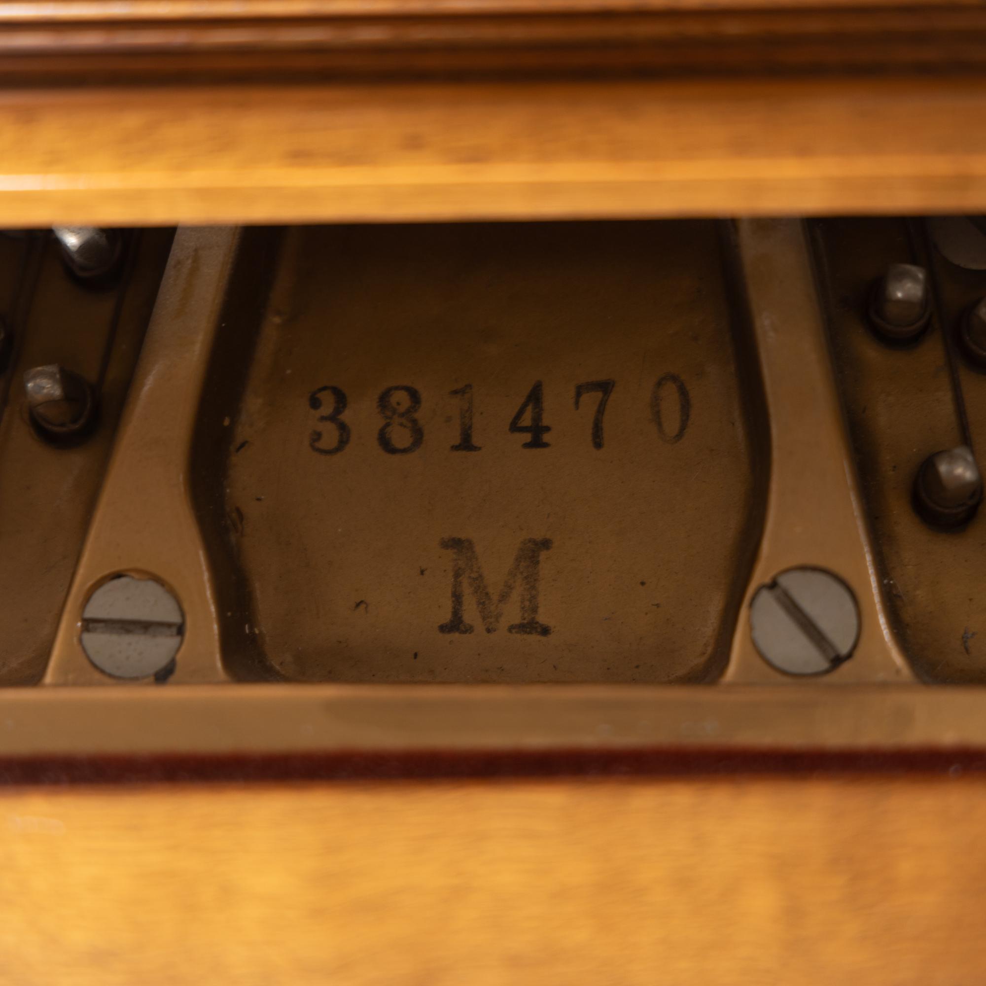 A Steinway and Sons Walnut Grand Piano