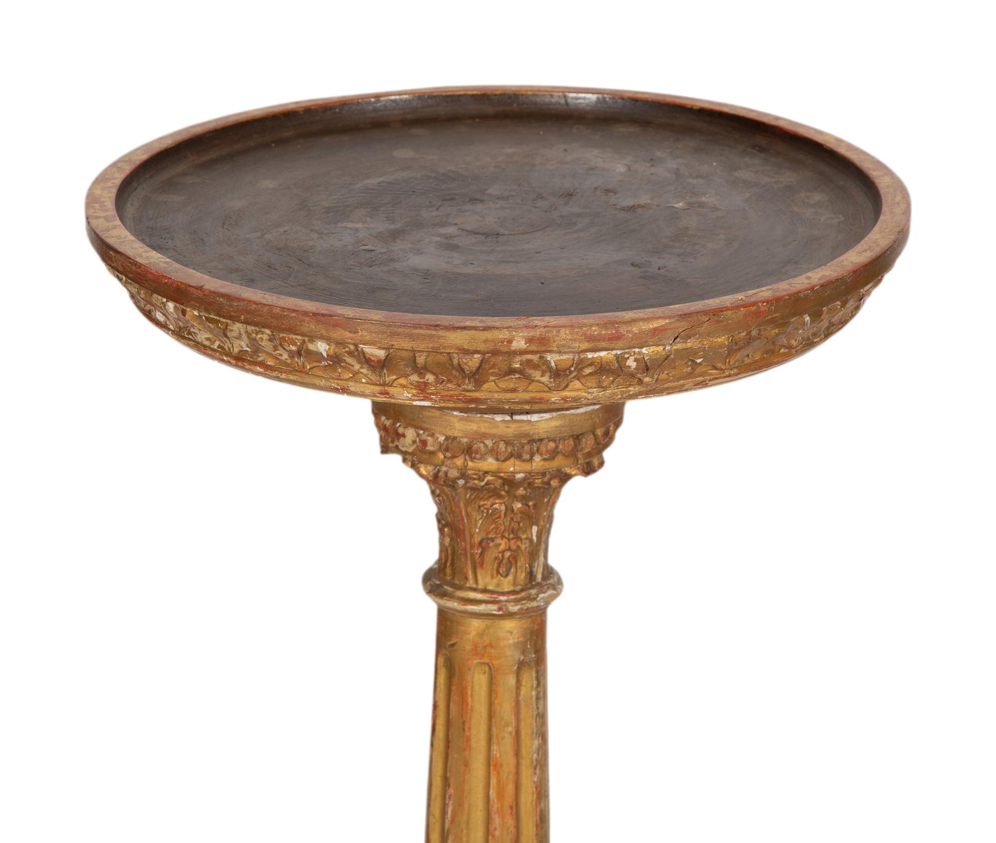 A Pair of Louis XVI Giltwood Pedestals