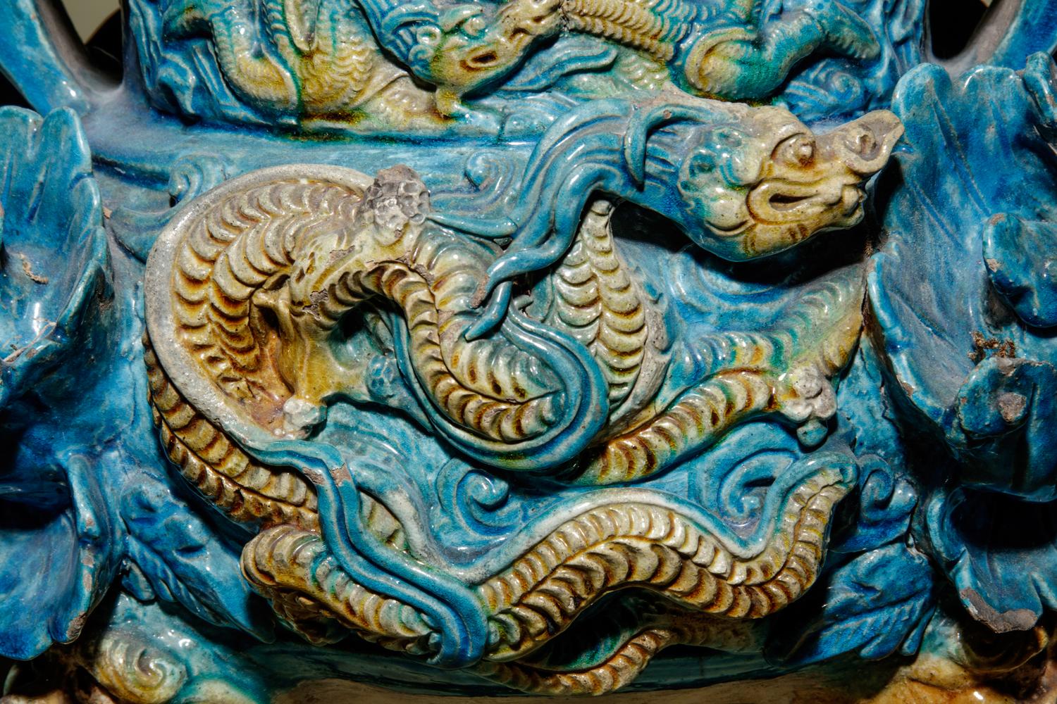 A Turquoise and Ochre Glazed Tileworks Tripod Incense Burner