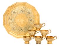 A Russian Silver-Gilt Liquor Service, Mark of Sazikov with Imperial Warrant, Moscow, 1861, comprising six cups and a tray, the cups of