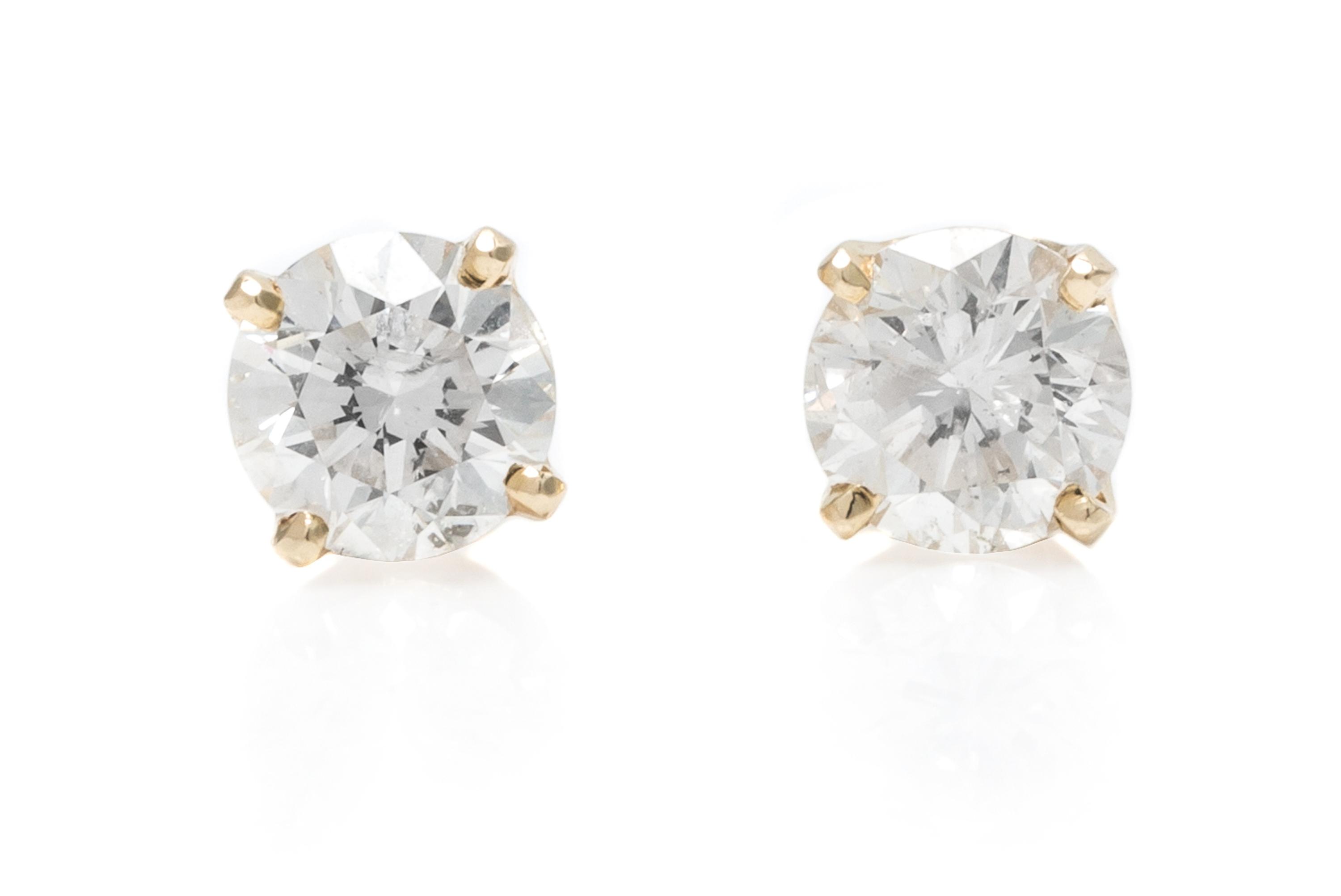 A Pair of Yellow Gold and Diamond Stud Earrings, 1.80 dwts.