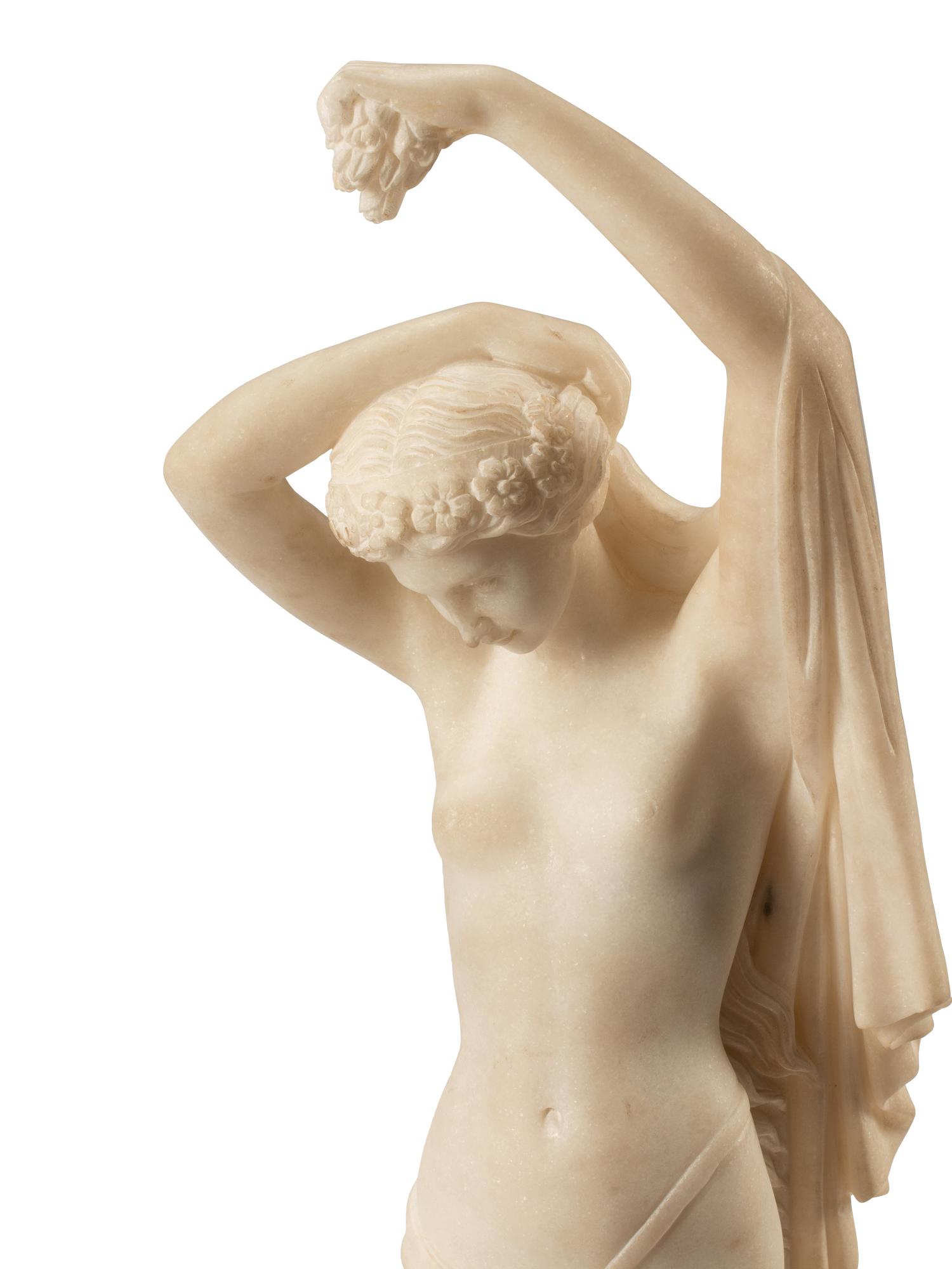 A Pair of Italian Marble Figures of Ladies with Cherubs