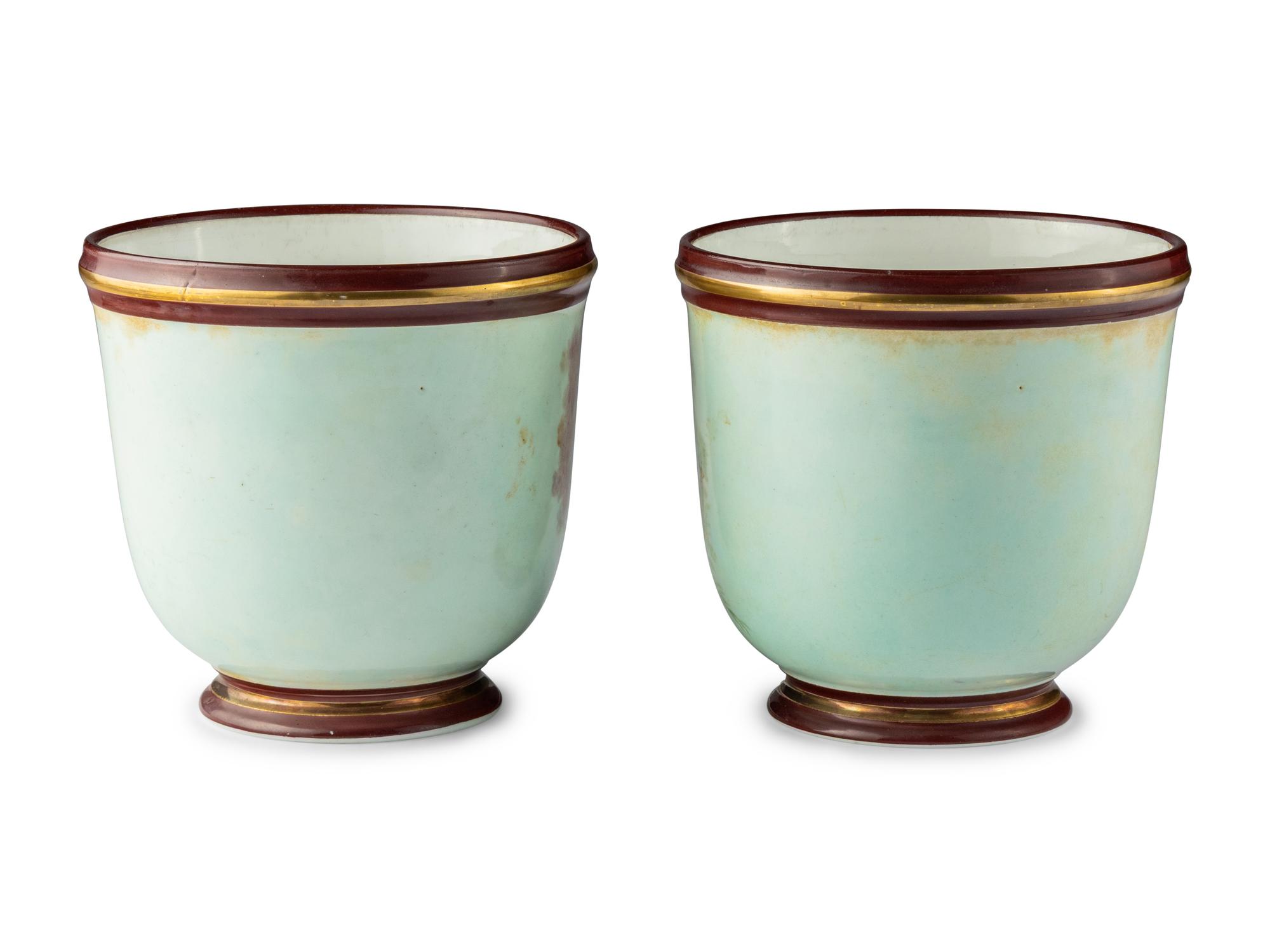 A Pair of Sèvres Style Porcelain Cache Pots