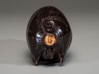 An Anna Pottery Incised and Brown Glazed Pig Flask