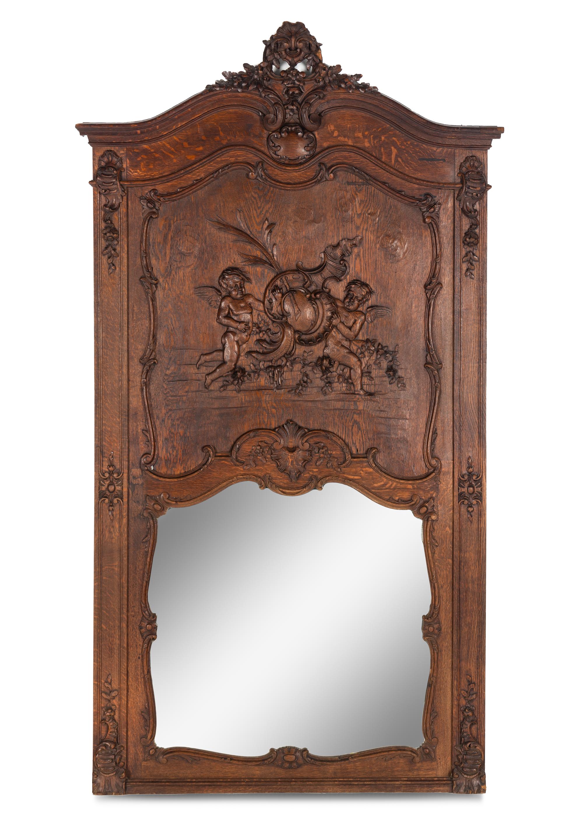 A French Carved Oak Trumeau Mirror