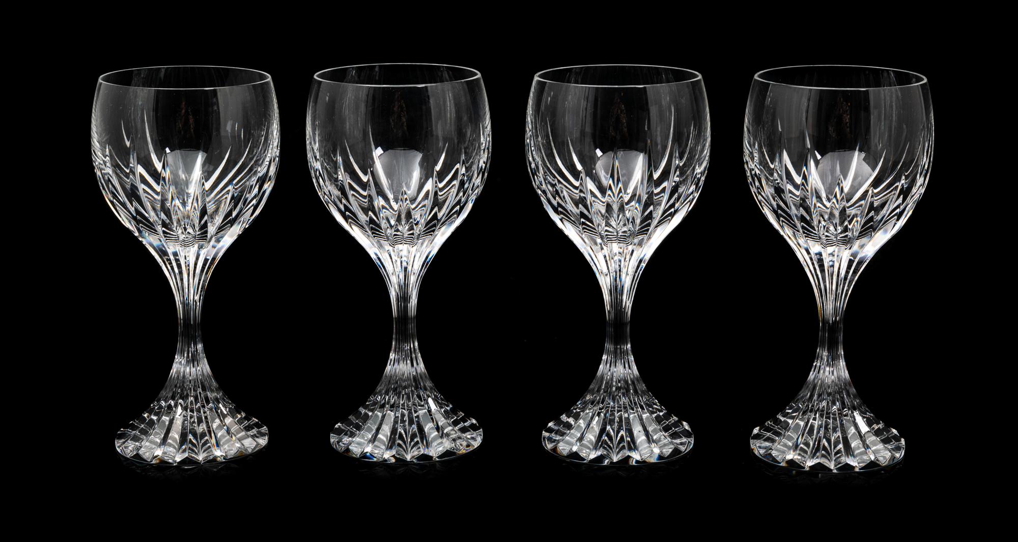 A Set of Twelve Baccarat Wine Glasses Height 7 inches.