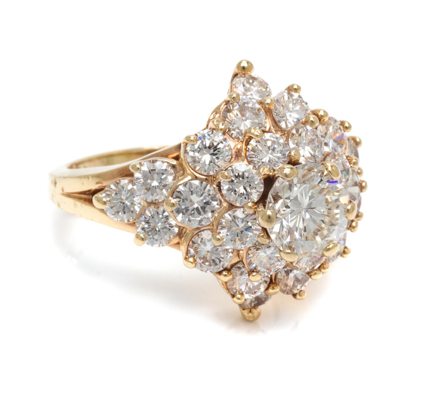 A 14 Karat Yellow Gold and Diamond Cluster Ring,