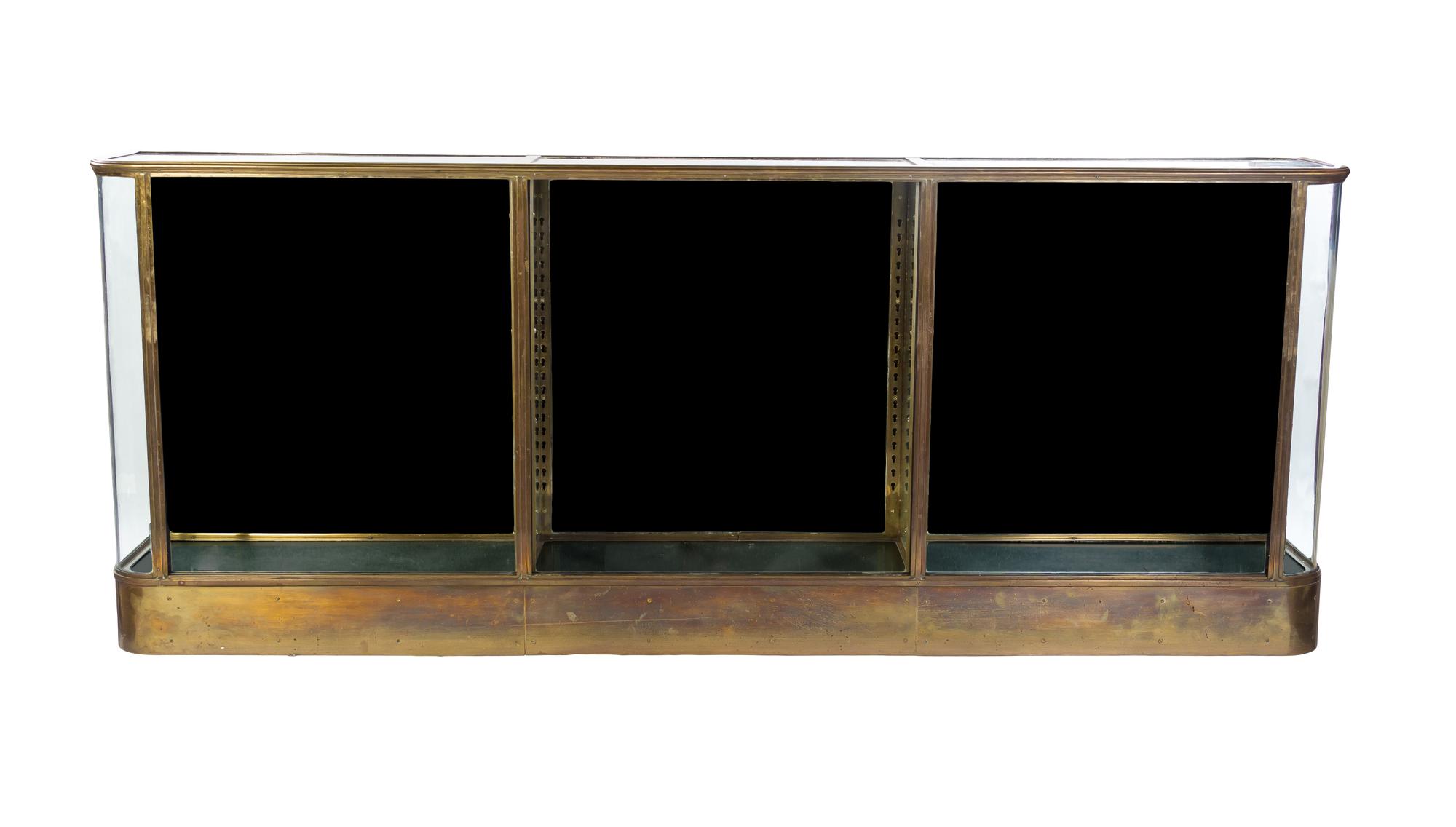 A French Gilt Metal and Glass Vitrine Cabinet, JOLY ET CIE, LATE 19TH/EARLY 20TH CENTURY, Height 39 1/2 x width 99 1/2 x depth 15 inch — JOLY ET CIE, LATE 19TH/EARLY 20TH CENTURY,