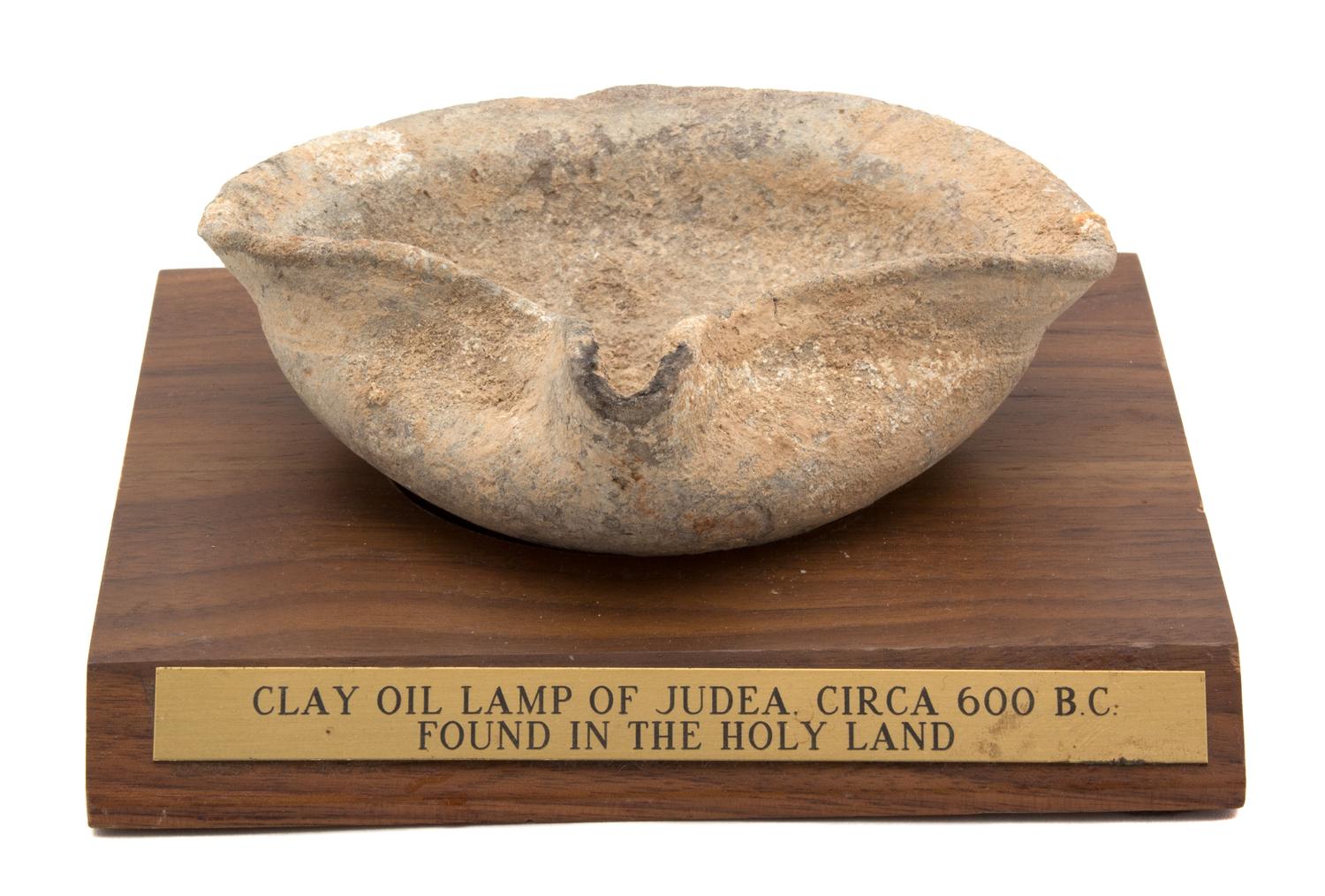 An Ancient Israeli Clay Oil Lamp Length 5 inches. — CIRCA 600 B.C.