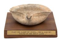 An Ancient Israeli Clay Oil Lamp Length 5 inches. — CIRCA 600 B.C.