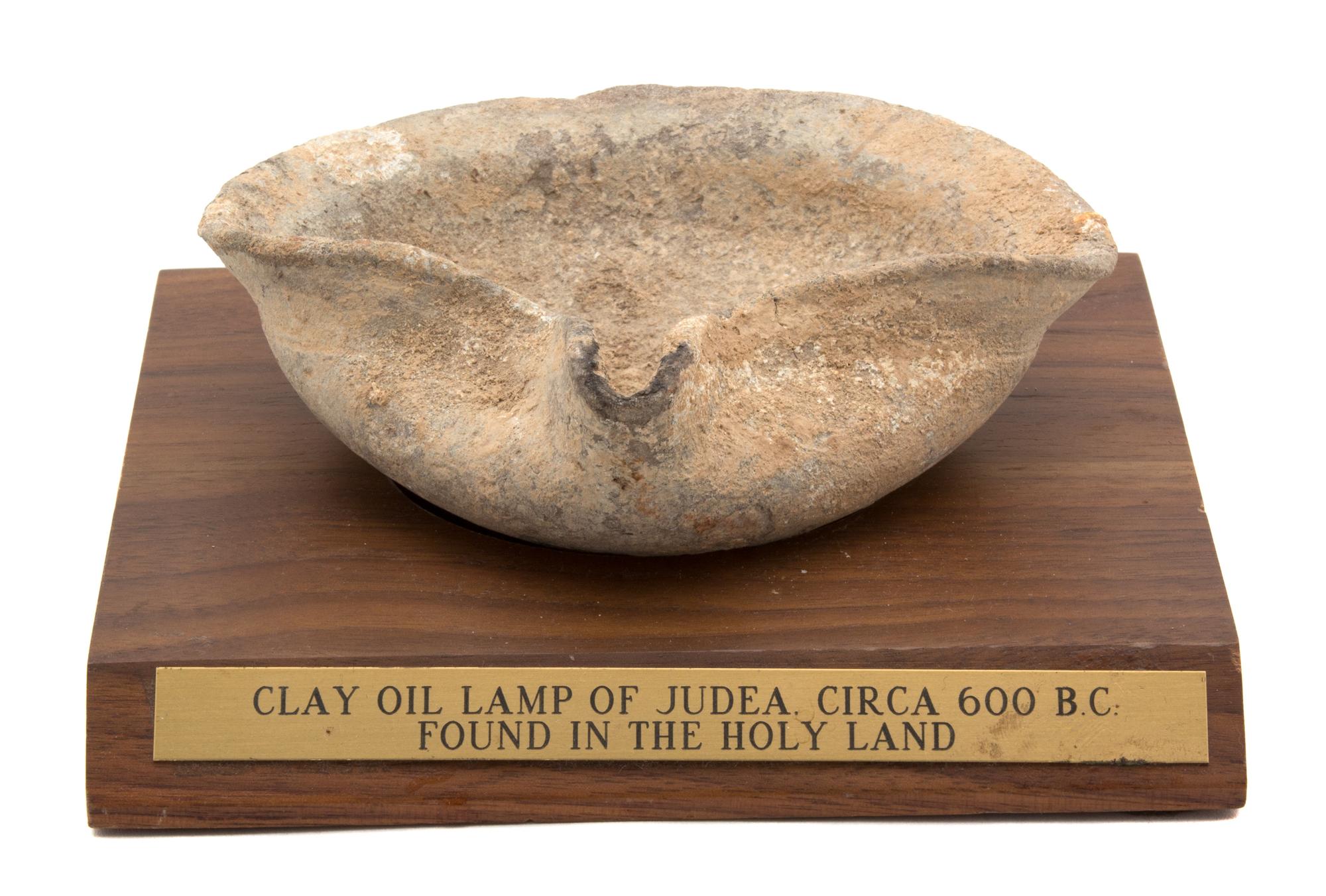 An Ancient Israeli Clay Oil Lamp Length 5 inches. — CIRCA 600 B.C.
