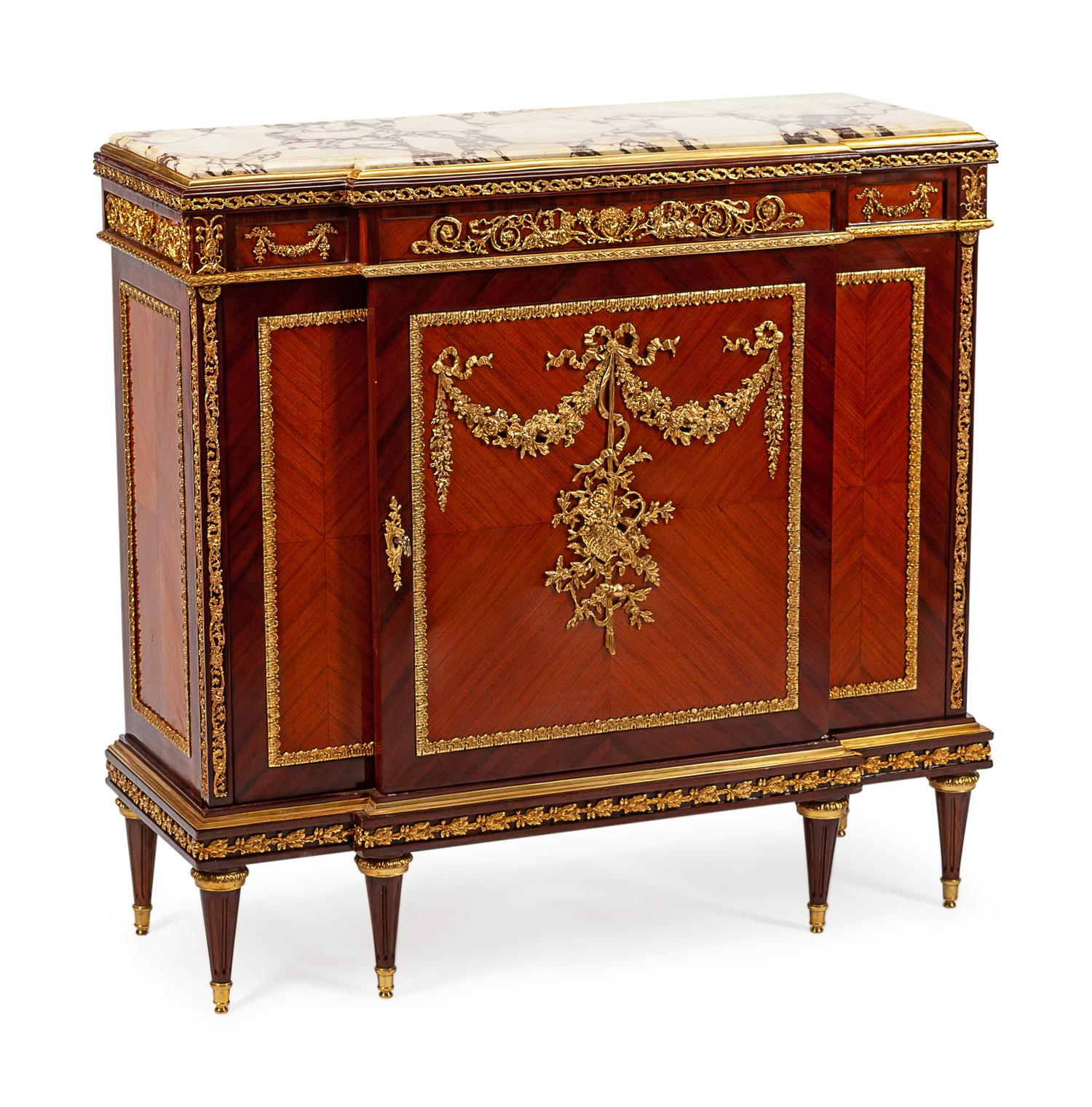 A Louis XVI Style Gilt Bronze Mounted Kingwood and Tulipwood Cabinet