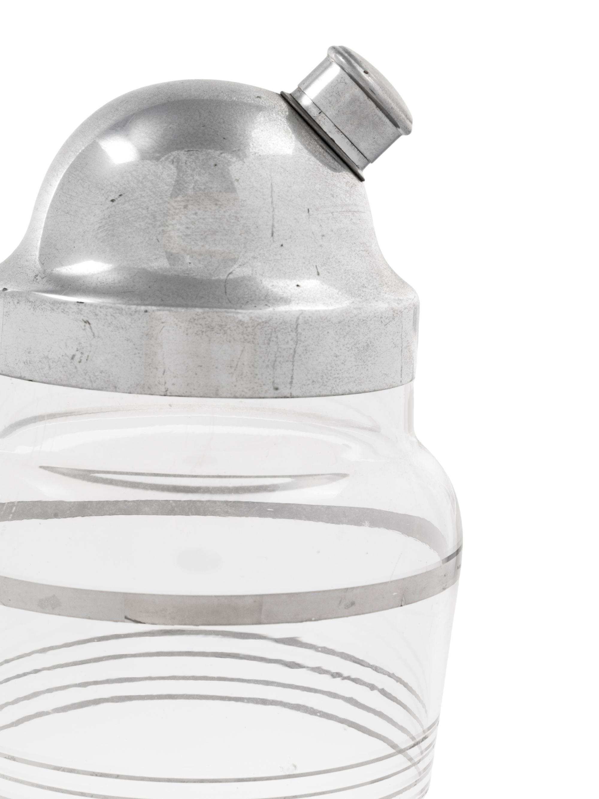 A Group of Three Cocktail Shakers