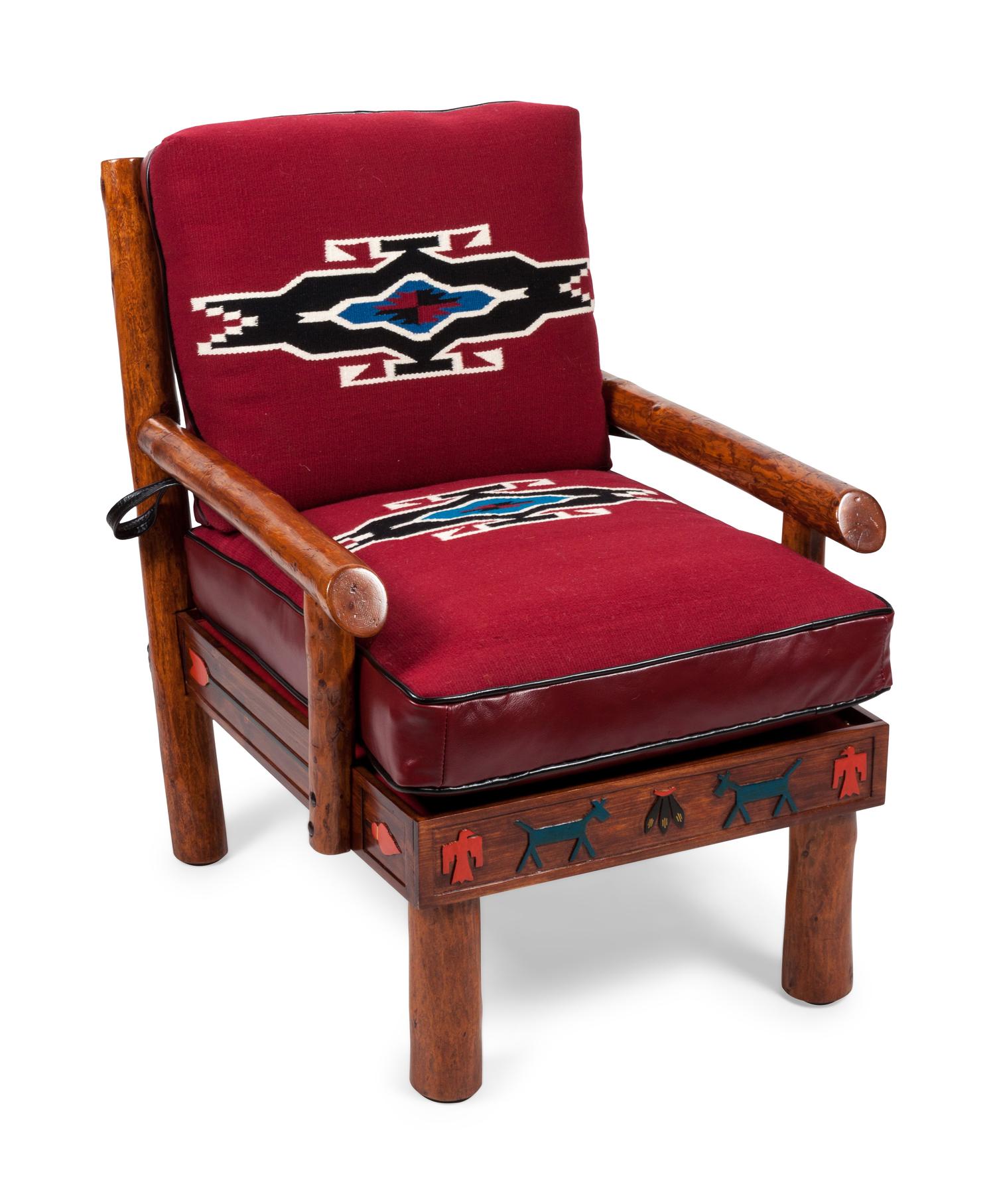 Hand peeled fir side chair with routed skirt, polychrome animal, eagle feather and arrow designs upholstered with Chimayo weaving