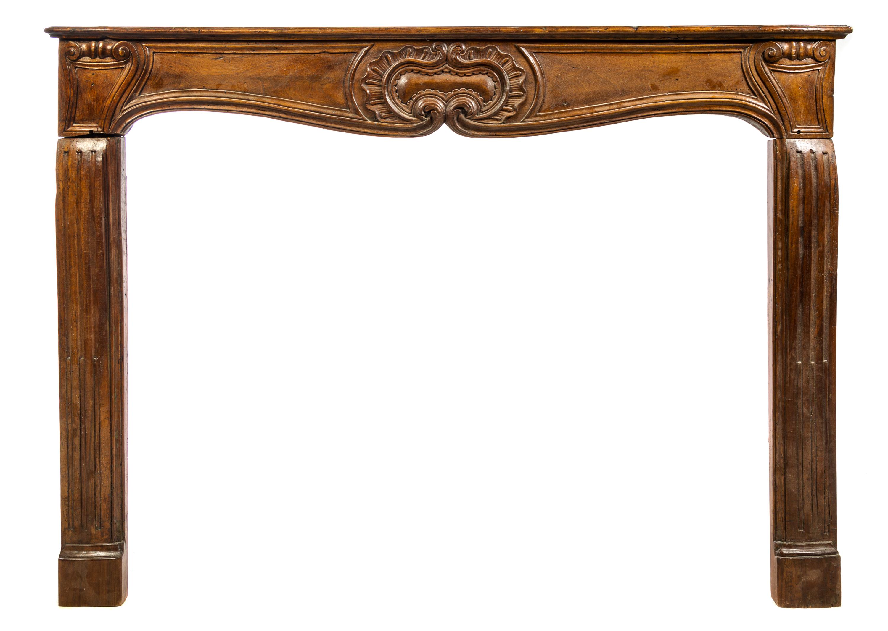 A French Walnut Mantel Height 52 x width 72 x depth 8 1/2 inches. — LATE 18TH CENTURY