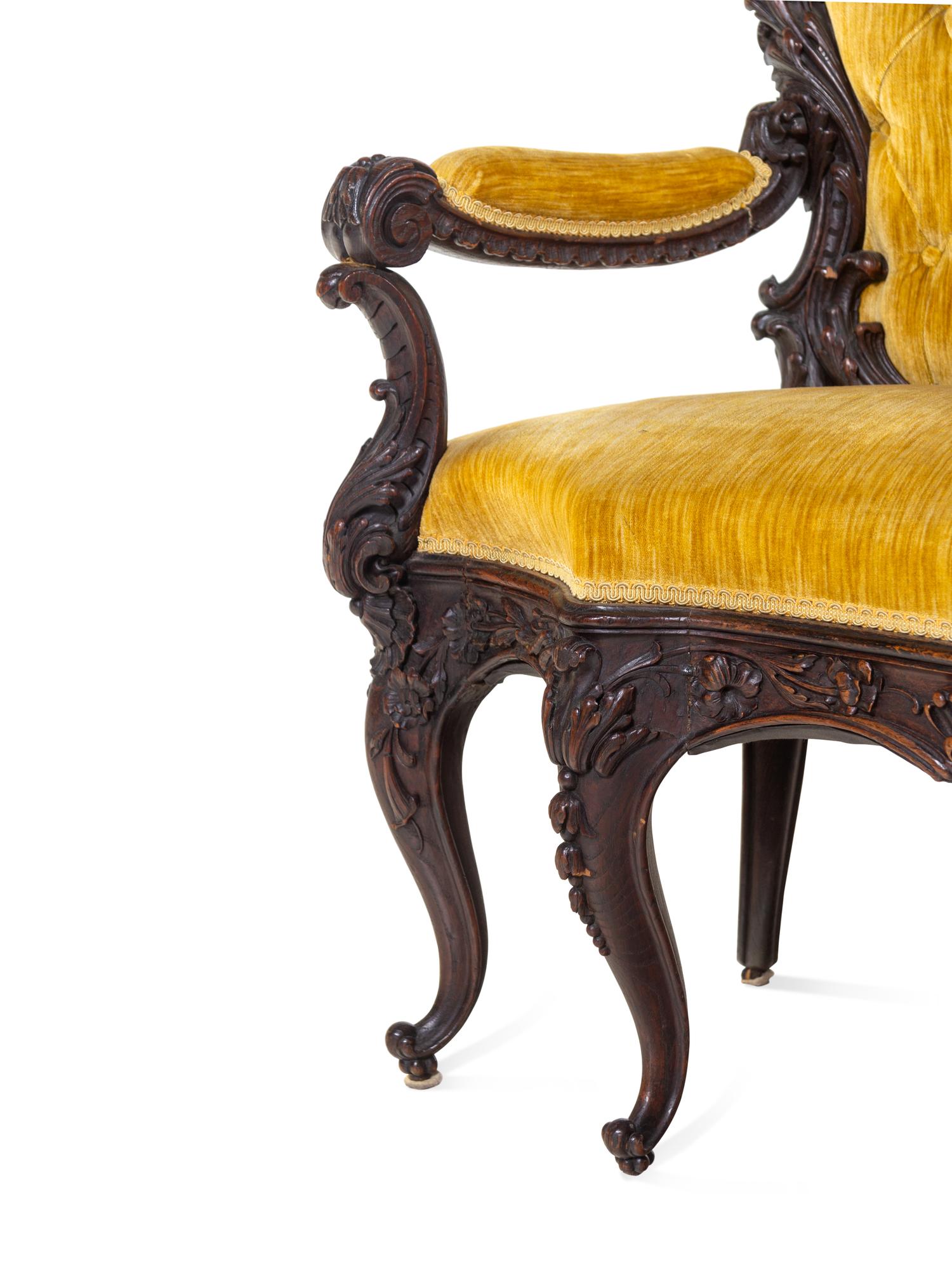 A Rococo Revival Carved Walnut Settee