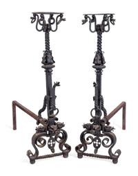 A Pair of Renaissance Style Wrought-Iron Andirons — IN THE MANNER OF SAMUEL YELLIN, EARLY 20TH CENTURY