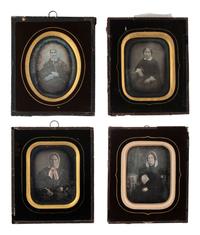 [EARLY PHOTOGRAPHY]. 17 likely European daguerreotypes of women housed in passe partout mounts.